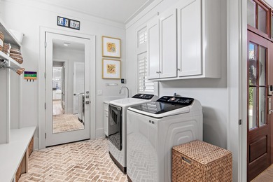 259 Moonlit Way is an exceptional Southerninspired residence on Regatta Bay Golf and Country Club in Florida - for sale on GolfHomes.com, golf home, golf lot