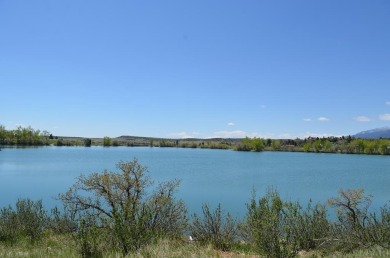 Experience modern country living with breathtaking mountain on Hollydot Golf Course in Colorado - for sale on GolfHomes.com, golf home, golf lot