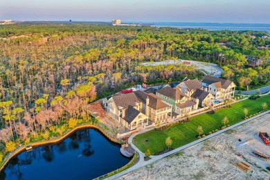 259 Moonlit Way is an exceptional Southerninspired residence on Regatta Bay Golf and Country Club in Florida - for sale on GolfHomes.com, golf home, golf lot