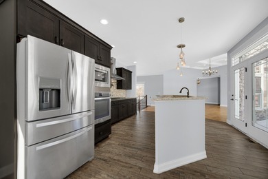 Offering nearly 4,500 finished square feet, this impressive on Sandy Pines Golf Course in Indiana - for sale on GolfHomes.com, golf home, golf lot