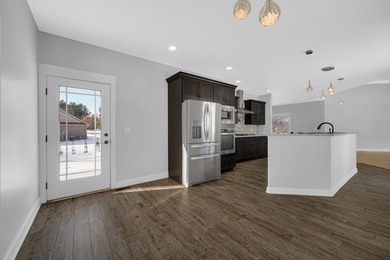 Offering nearly 4,500 finished square feet, this impressive on Sandy Pines Golf Course in Indiana - for sale on GolfHomes.com, golf home, golf lot