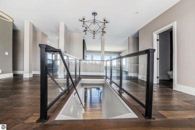 Private Luxury Estate with Panoramic Bay Views in Gated on Lochen Heath Golf Course in Michigan - for sale on GolfHomes.com, golf home, golf lot