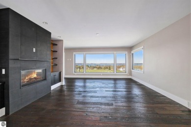 Private Luxury Estate with Panoramic Bay Views in Gated on Lochen Heath Golf Course in Michigan - for sale on GolfHomes.com, golf home, golf lot