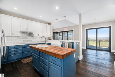 Private Luxury Estate with Panoramic Bay Views in Gated on Lochen Heath Golf Course in Michigan - for sale on GolfHomes.com, golf home, golf lot
