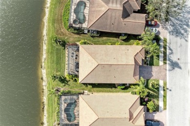 This exquisite residence within River Strand Golf and Country on River Strand Golf and Country Club At Heritage Harbour  in Florida - for sale on GolfHomes.com, golf home, golf lot