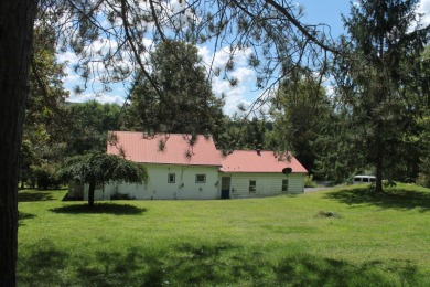 Welcome home to a slice of history with modern potential! This on Afton Golf Club in New York - for sale on GolfHomes.com, golf home, golf lot
