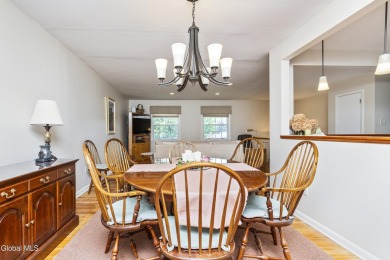 Expansive perennial gardens create a scenic park-like setting on Schuyler Meadows Club in New York - for sale on GolfHomes.com, golf home, golf lot