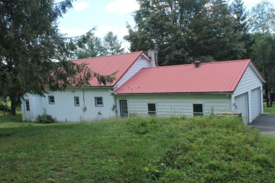 Welcome home to a slice of history with modern potential! This on Afton Golf Club in New York - for sale on GolfHomes.com, golf home, golf lot