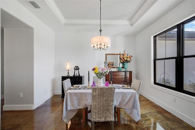 Welcome to your Florida dream home, beautifully positioned on a on Sabal Trace Golf and Country Club in Florida - for sale on GolfHomes.com, golf home, golf lot