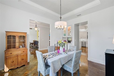 Welcome to your Florida dream home, beautifully positioned on a on Sabal Trace Golf and Country Club in Florida - for sale on GolfHomes.com, golf home, golf lot