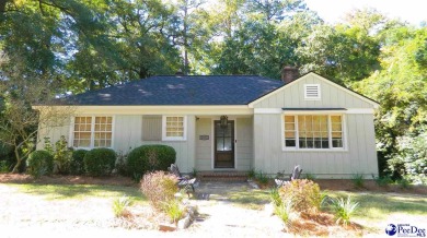 Discover the perfect blend of comfort and charm in this on Florence Country Club in South Carolina - for sale on GolfHomes.com, golf home, golf lot