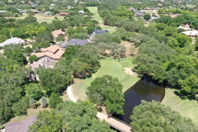 Nestled beneath a canopy of century-old oaks on 1.5 scenic lots on Ram Rock Golf Course in Texas - for sale on GolfHomes.com, golf home, golf lot