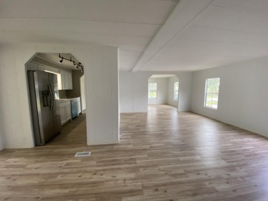 This home has been totally renovated.  New kitchen, bathrooms on Spanish Lakes Golf Village in Florida - for sale on GolfHomes.com, golf home, golf lot