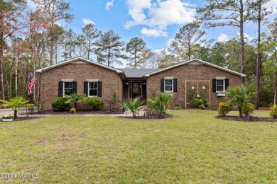 Beautiful brick home completely remodeled on the 8th fairway of on Harbour Point Golf Club in North Carolina - for sale on GolfHomes.com, golf home, golf lot