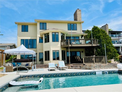 Rare opportunity to own a luxury lakefront home in the private on Lakes of the Four Seasons Country Club in Indiana - for sale on GolfHomes.com, golf home, golf lot