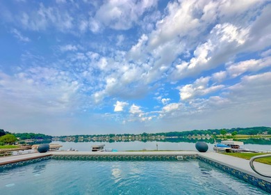 Rare opportunity to own a luxury lakefront home in the private on Lakes of the Four Seasons Country Club in Indiana - for sale on GolfHomes.com, golf home, golf lot