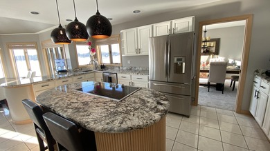 Rare opportunity to own a luxury lakefront home in the private on Lakes of the Four Seasons Country Club in Indiana - for sale on GolfHomes.com, golf home, golf lot