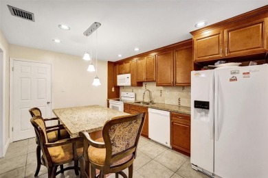 Rarely available corner unit located in the desired community of on Jacaranda Golf Club in Florida - for sale on GolfHomes.com, golf home, golf lot