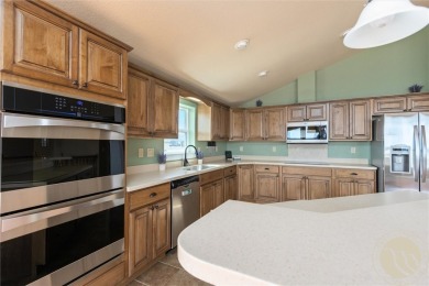 STUNNING 5-BEDROOM 3-BATH HOME OVERLOOKING THE 6TH HOLE OF PRYOR on Pryor Creek Golf Club in Montana - for sale on GolfHomes.com, golf home, golf lot
