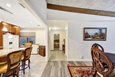 Rarely available corner unit located in the desired community of on Jacaranda Golf Club in Florida - for sale on GolfHomes.com, golf home, golf lot