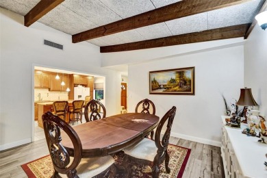 Rarely available corner unit located in the desired community of on Jacaranda Golf Club in Florida - for sale on GolfHomes.com, golf home, golf lot