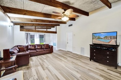 Rarely available corner unit located in the desired community of on Jacaranda Golf Club in Florida - for sale on GolfHomes.com, golf home, golf lot