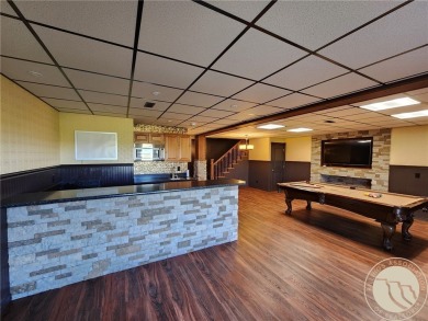 STUNNING 5-BEDROOM 3-BATH HOME OVERLOOKING THE 6TH HOLE OF PRYOR on Pryor Creek Golf Club in Montana - for sale on GolfHomes.com, golf home, golf lot