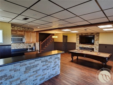 STUNNING 5-BEDROOM 3-BATH HOME OVERLOOKING THE 6TH HOLE OF PRYOR on Pryor Creek Golf Club in Montana - for sale on GolfHomes.com, golf home, golf lot