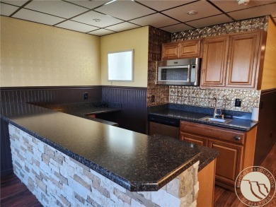 STUNNING 5-BEDROOM 3-BATH HOME OVERLOOKING THE 6TH HOLE OF PRYOR on Pryor Creek Golf Club in Montana - for sale on GolfHomes.com, golf home, golf lot