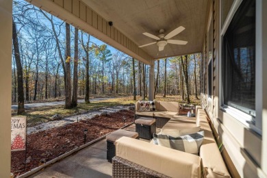 Nestled on a serene wooded lot in the Diamondhead community on Diamondhead Golf and Country Club in Arkansas - for sale on GolfHomes.com, golf home, golf lot