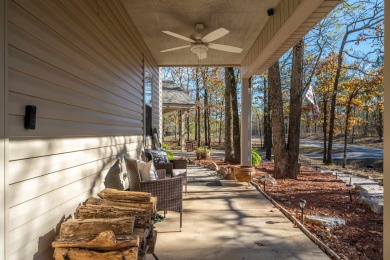 Nestled on a serene wooded lot in the Diamondhead community on Diamondhead Golf and Country Club in Arkansas - for sale on GolfHomes.com, golf home, golf lot