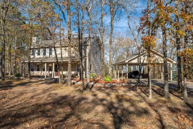 Nestled on a serene wooded lot in the Diamondhead community on Diamondhead Golf and Country Club in Arkansas - for sale on GolfHomes.com, golf home, golf lot