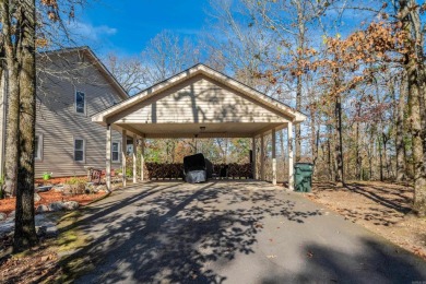 Nestled on a serene wooded lot in the Diamondhead community on Diamondhead Golf and Country Club in Arkansas - for sale on GolfHomes.com, golf home, golf lot