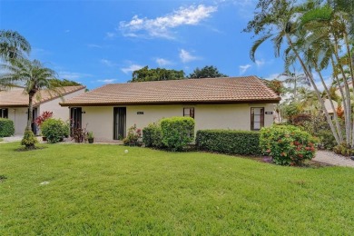 Rarely available corner unit located in the desired community of on Jacaranda Golf Club in Florida - for sale on GolfHomes.com, golf home, golf lot