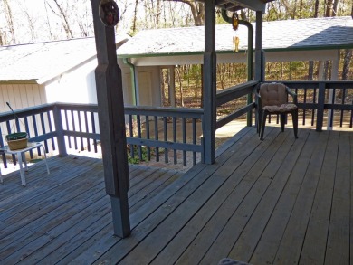 HOME WITH LARGE SHOP AND PRIVACY!  1,492 square foot home great on Cherokee Village North Course in Arkansas - for sale on GolfHomes.com, golf home, golf lot
