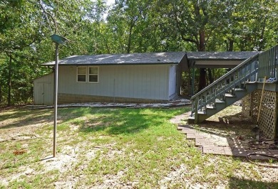 HOME WITH LARGE SHOP AND PRIVACY!  1,492 square foot home great on Cherokee Village North Course in Arkansas - for sale on GolfHomes.com, golf home, golf lot