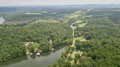 YEAR ROUND WATER - PRIME WATERFRONT LOT... With just over an on Bear Trace At Harrison Bay in Tennessee - for sale on GolfHomes.com, golf home, golf lot