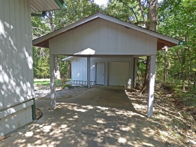 HOME WITH LARGE SHOP AND PRIVACY!  1,492 square foot home great on Cherokee Village North Course in Arkansas - for sale on GolfHomes.com, golf home, golf lot