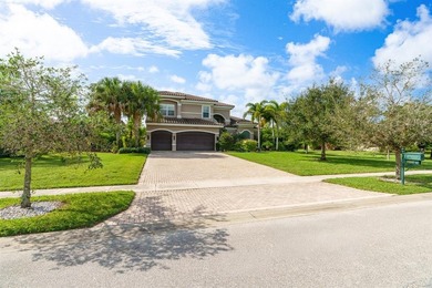 Step onto this stunning contemporary 5B/4Full BA/3 car gar on PGA National Estates Golf Course in Florida - for sale on GolfHomes.com, golf home, golf lot