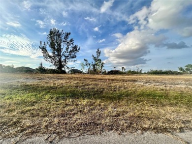 Oversized lot on a very large canal with a beautiful western on Coral Oaks Golf Course in Florida - for sale on GolfHomes.com, golf home, golf lot