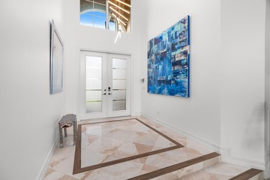 Step onto this stunning contemporary 5B/4Full BA/3 car gar on PGA National Estates Golf Course in Florida - for sale on GolfHomes.com, golf home, golf lot