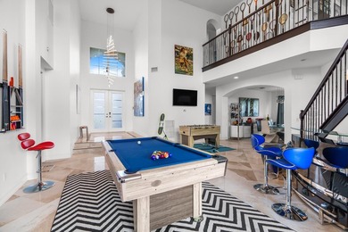 Step onto this stunning contemporary 5B/4Full BA/3 car gar on PGA National Estates Golf Course in Florida - for sale on GolfHomes.com, golf home, golf lot