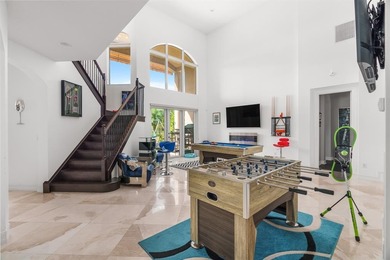 Step onto this stunning contemporary 5B/4Full BA/3 car gar on PGA National Estates Golf Course in Florida - for sale on GolfHomes.com, golf home, golf lot