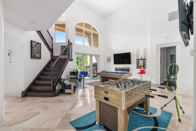 Step onto this stunning contemporary 5B/4Full BA/3 car gar on PGA National Estates Golf Course in Florida - for sale on GolfHomes.com, golf home, golf lot