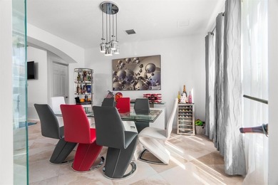 Step onto this stunning contemporary 5B/4Full BA/3 car gar on PGA National Estates Golf Course in Florida - for sale on GolfHomes.com, golf home, golf lot