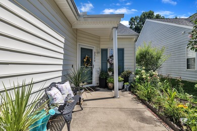 As you enter your new home nestled between the 15th and 16th on Hedingham Golf and Athletic Club in North Carolina - for sale on GolfHomes.com, golf home, golf lot