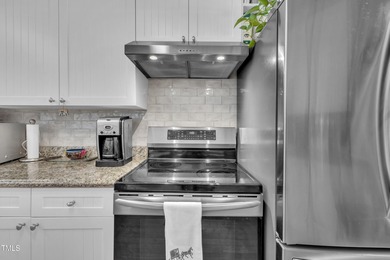 As you enter your new home nestled between the 15th and 16th on Hedingham Golf and Athletic Club in North Carolina - for sale on GolfHomes.com, golf home, golf lot