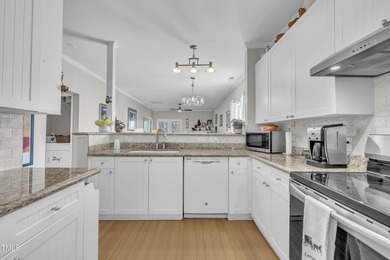 As you enter your new home nestled between the 15th and 16th on Hedingham Golf and Athletic Club in North Carolina - for sale on GolfHomes.com, golf home, golf lot