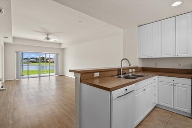 If you want relaxing, tranquil water views and beautiful sunsets on Sabal Trace Golf and Country Club in Florida - for sale on GolfHomes.com, golf home, golf lot