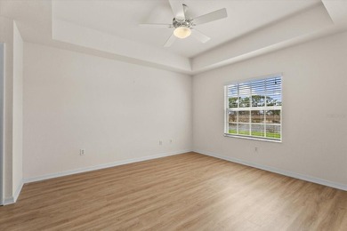 If you want relaxing, tranquil water views and beautiful sunsets on Sabal Trace Golf and Country Club in Florida - for sale on GolfHomes.com, golf home, golf lot